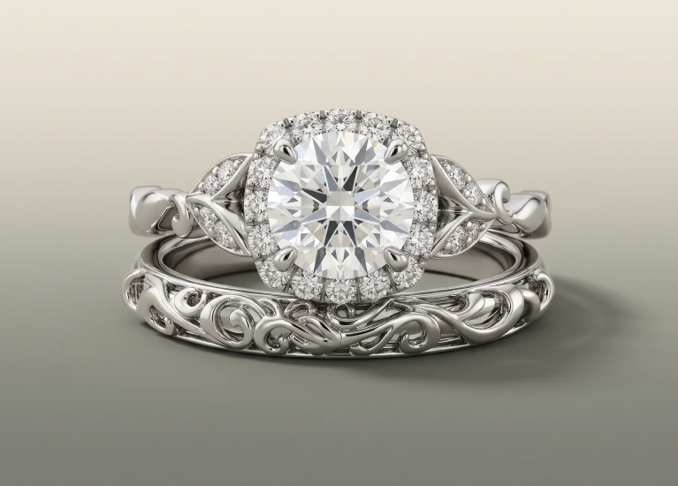 Rentata halo engagement ring nested with the Esme floral wedding band