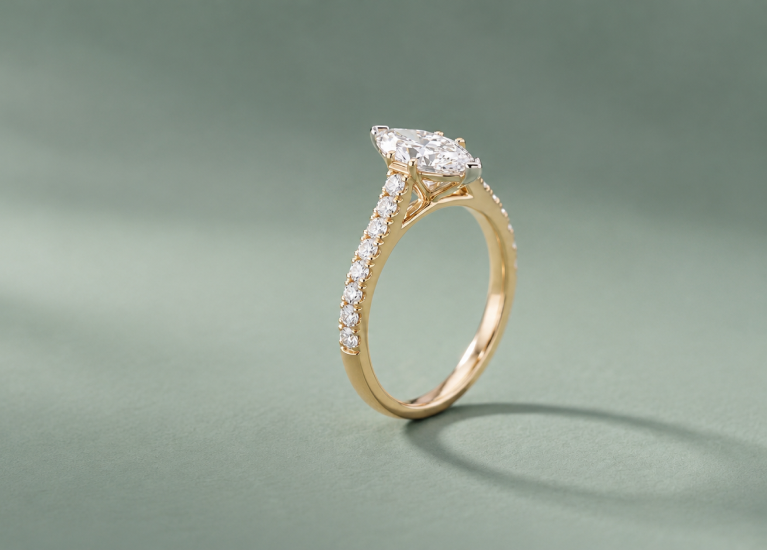 Aida Marquise engagement ring styled for SAMA's Drop Hint feature
