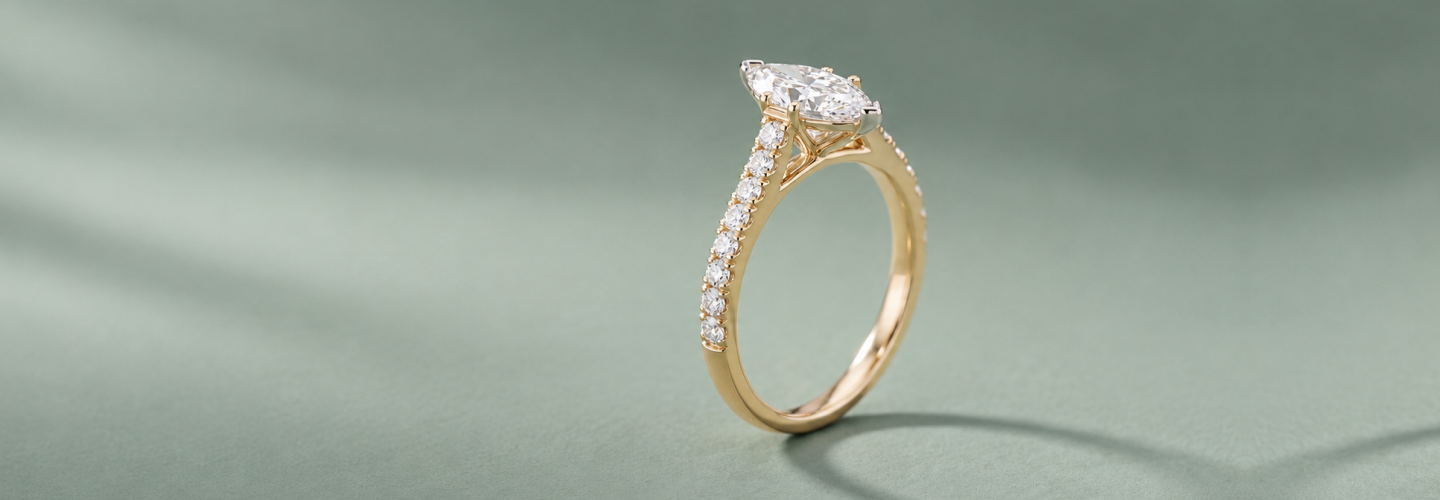 Aida Marquise engagement ring styled for SAMA's Drop Hint feature