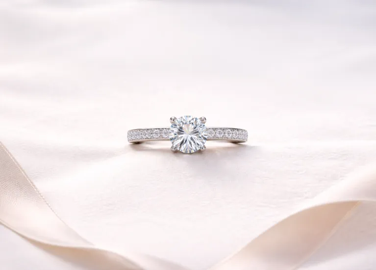 Round diamond solitaire ring styled in a neutral setting symbolizing choice and clarity
