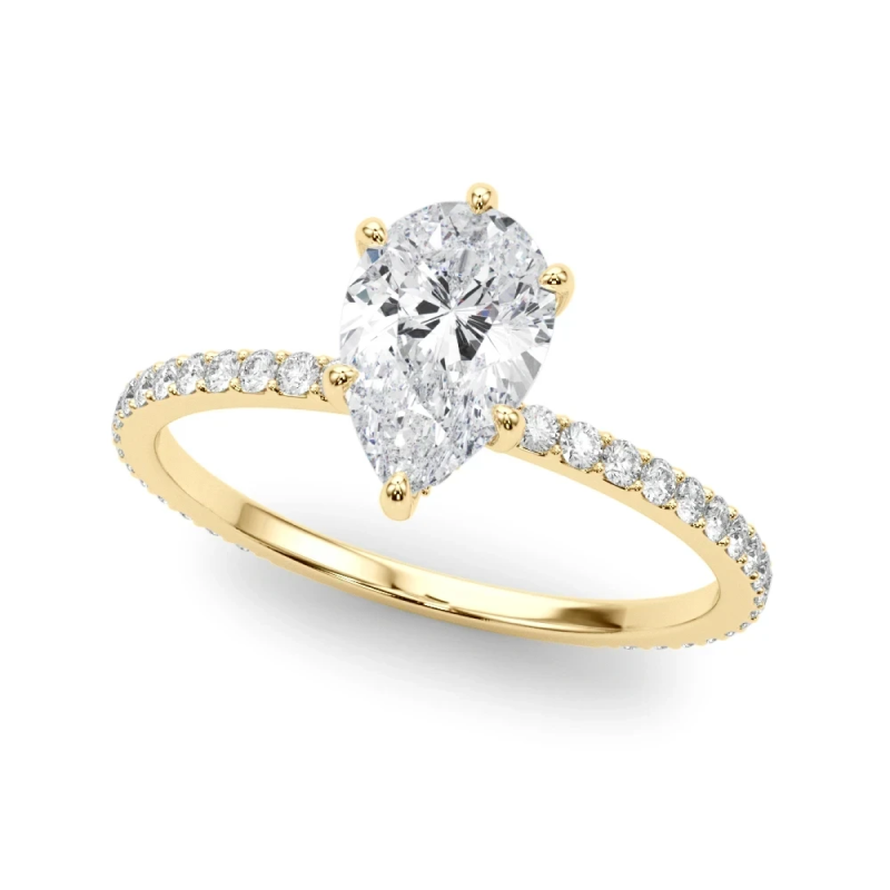 Talitha pear-shaped solitaire engagement ring in yellow gold showing elongated diamond appearance