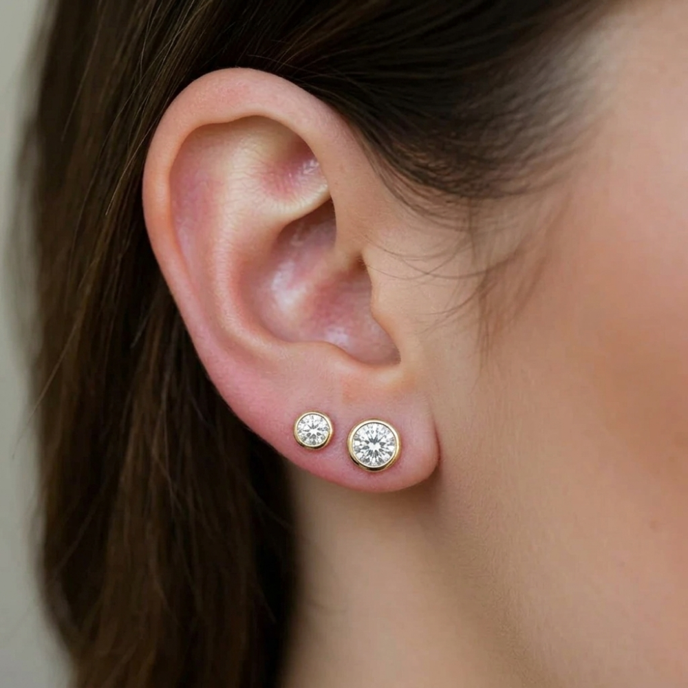 Diamond stud earrings representing everyday jewelry staples
