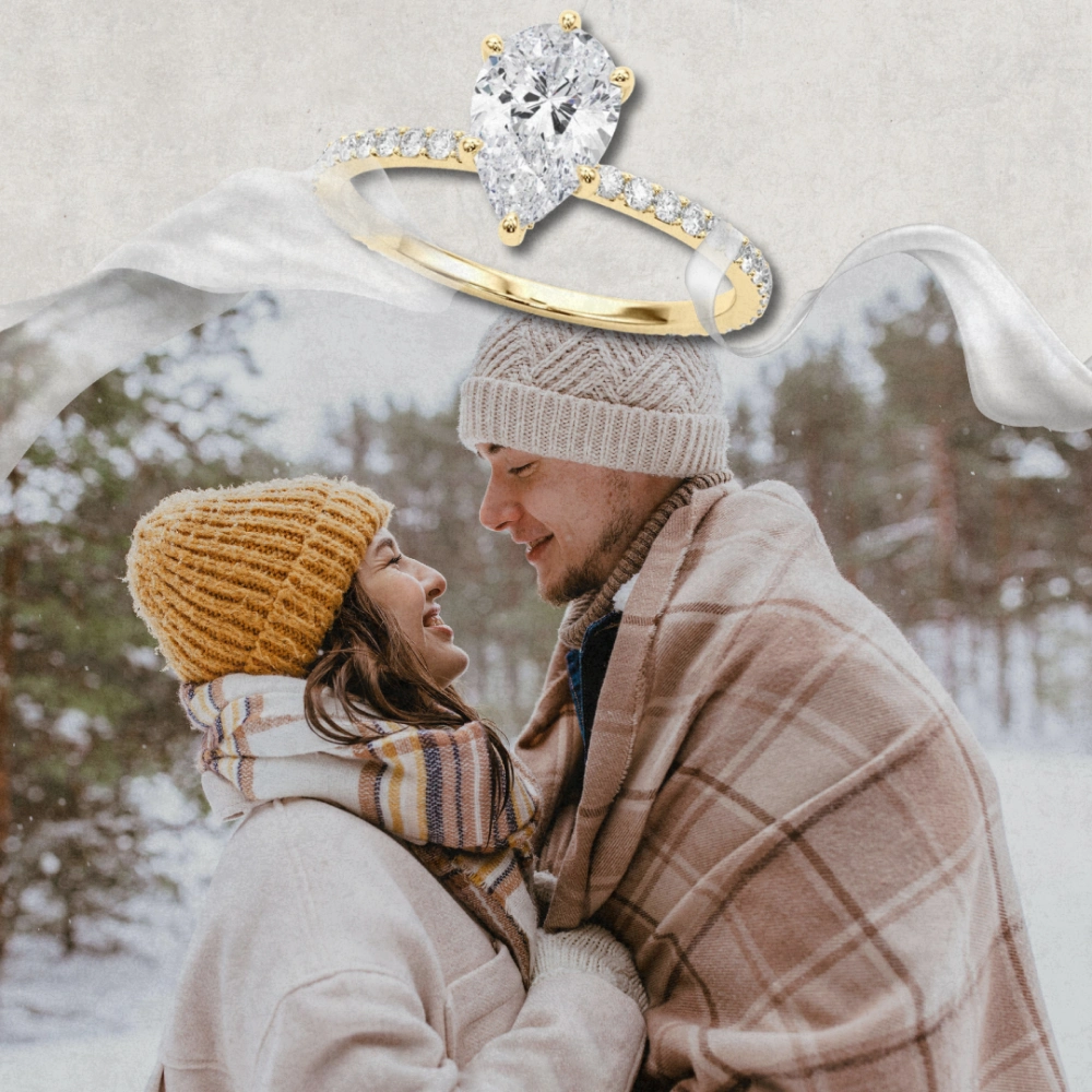 Pear-shaped diamond engagement ring photographed alongside a winter holiday engagement moment
