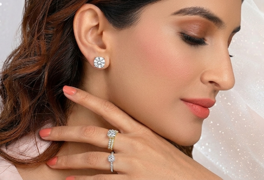 Woman wearing diamond engagement rings — solitaire and pavé settings — showcasing SAMA promo offer.