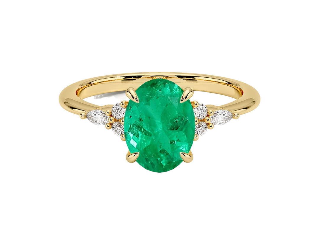 Green oval-cut emerald engagement ring in yellow gold by SAMA