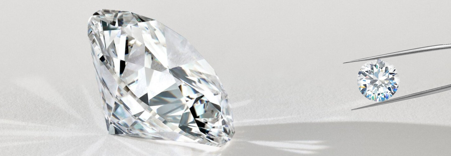 Ethical diamonds — loose diamonds on gray background