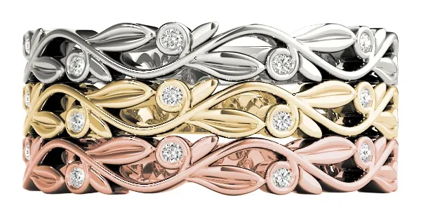 Stella wedding band with floral details and round bezel-set diamonds