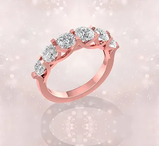 Rose gold trellis engagement ring with four round diamonds by SAMA