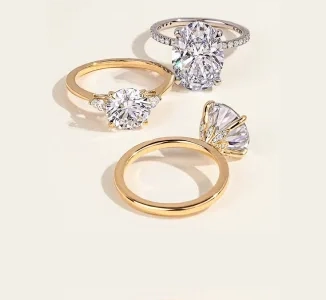 Gold and platinum engagement rings with solitaire and halo diamond settings by SAMA Bridal Jewelry