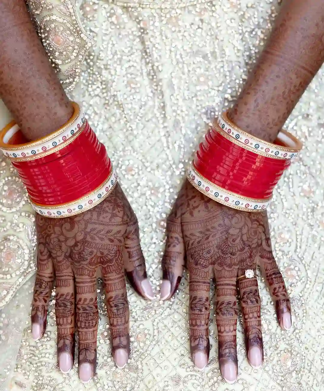 Bride’s hands with bridal jewelry rings — SAMA’s bridal story rooted in culture and community.